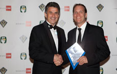 John Covich on the right receievs his HIA award for best renovation under $8000,000